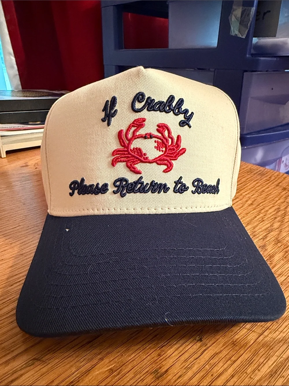 C.C Cream and Navy Trucker Hat with Red Crab Embroidery